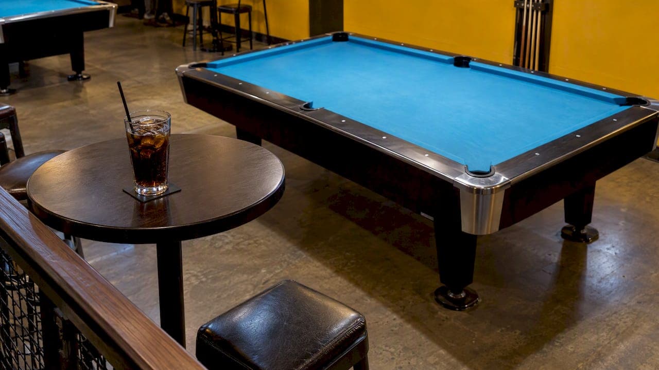 Drinks on a Pool Table: What's Okay, What Isn't, and Why